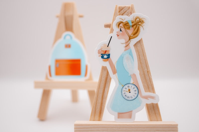 Die-cut Cinderella sticker for iPhone that reimagines the Disney princess as a regular park guest.